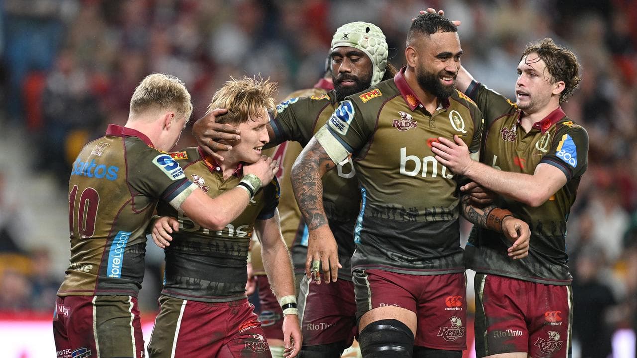 Celebrating Queensland Reds players.