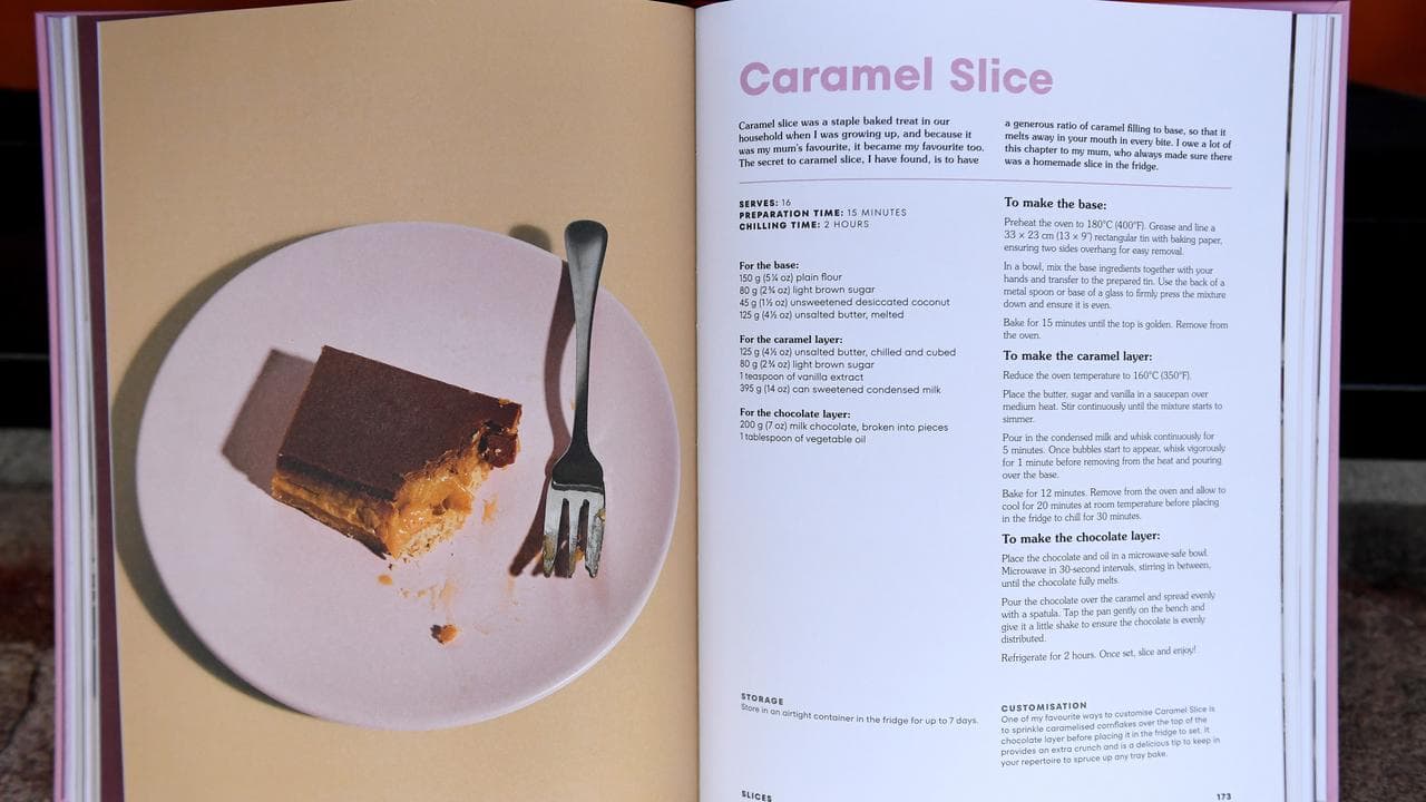 A recipe for caramel slice in a copy of Bake with Brooki