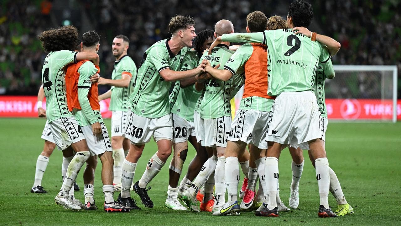 Western United players celebrate the winning