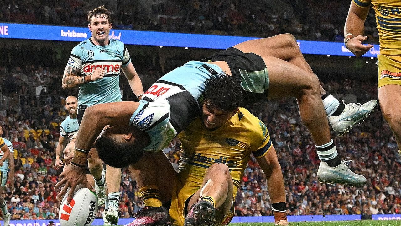 Ronald Mulitalo scores a try which was later disallowed.