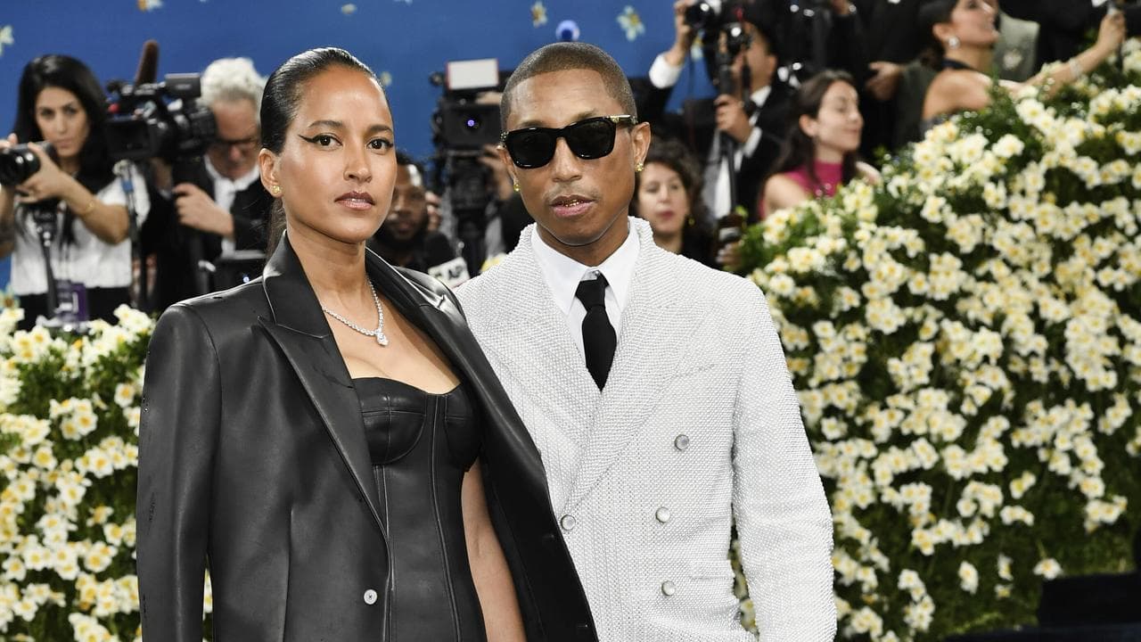 Helen Lasichanh and Pharrell Williams