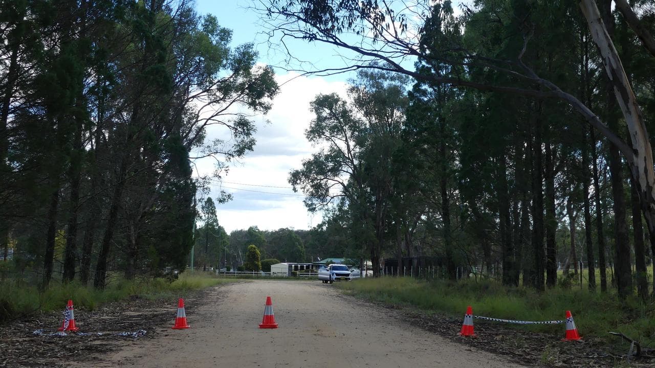 The scene near a house where two young boys were found dead.