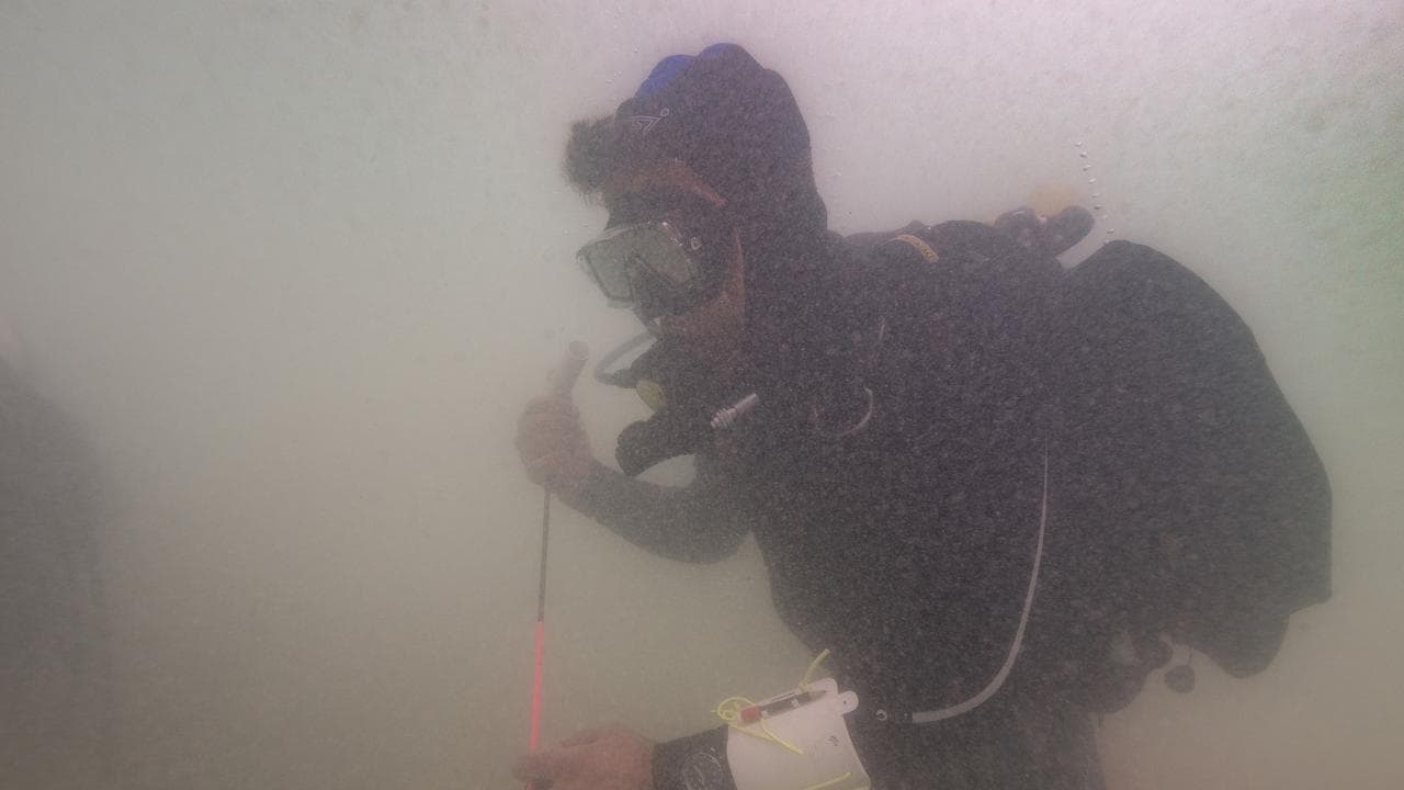 Mark Polzer during a metal detector survey for the shipwreck