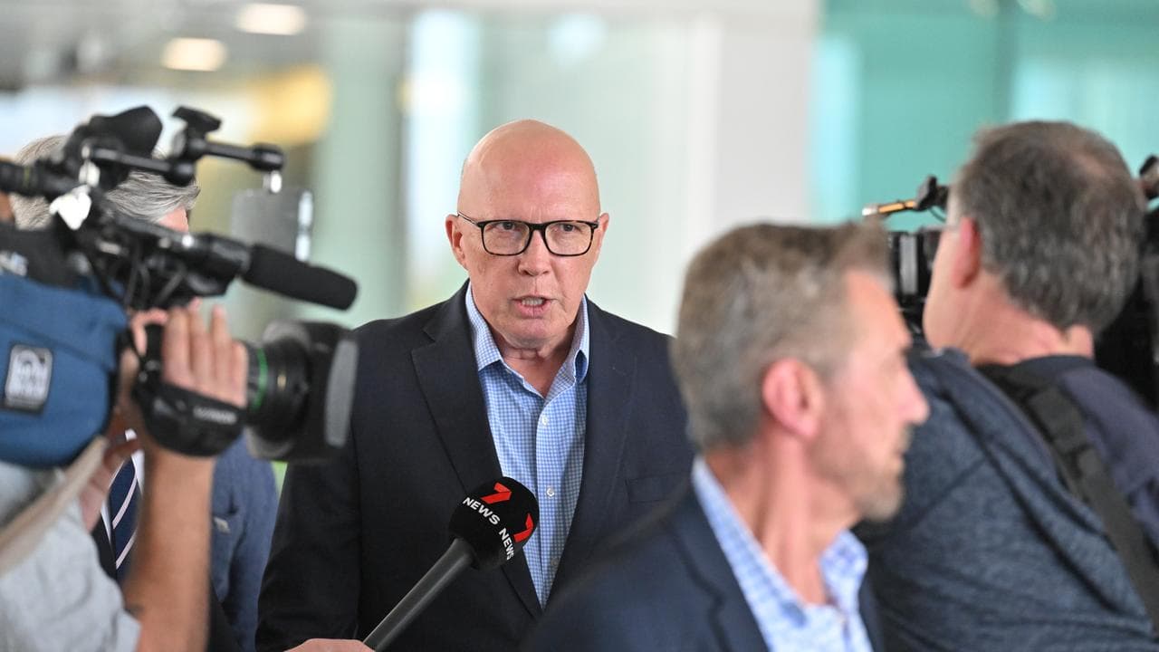 Peter Dutton talks to reporters at airport