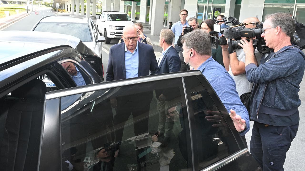 Dutton enters car at Canberra airport
