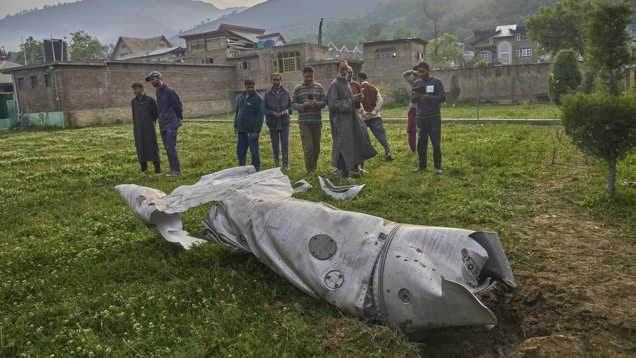 Aircraft debris in the compound of a mosque in Indian Kashmir
