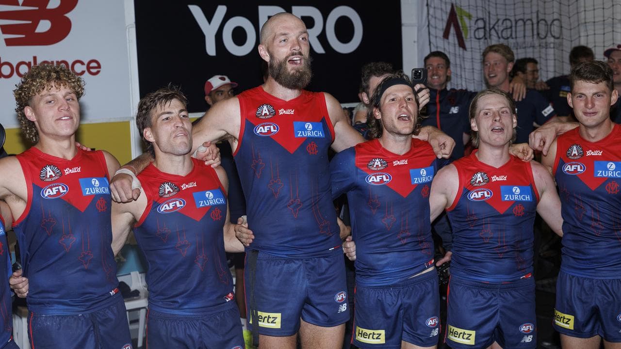 Melbourne players sing the team song.
