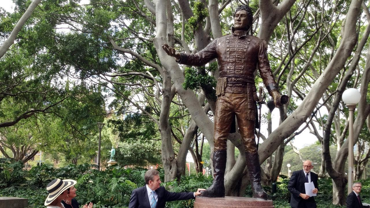 The statue being unveiled (file)