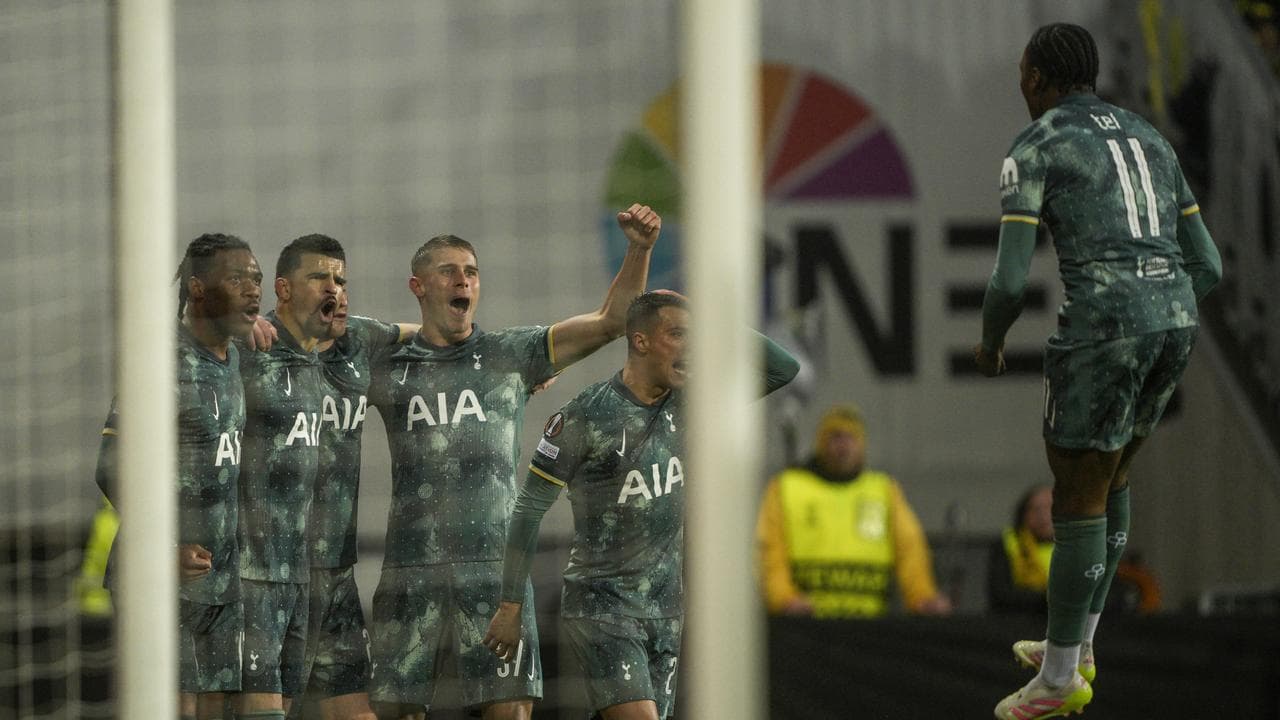 Celebrating Tottenham players.