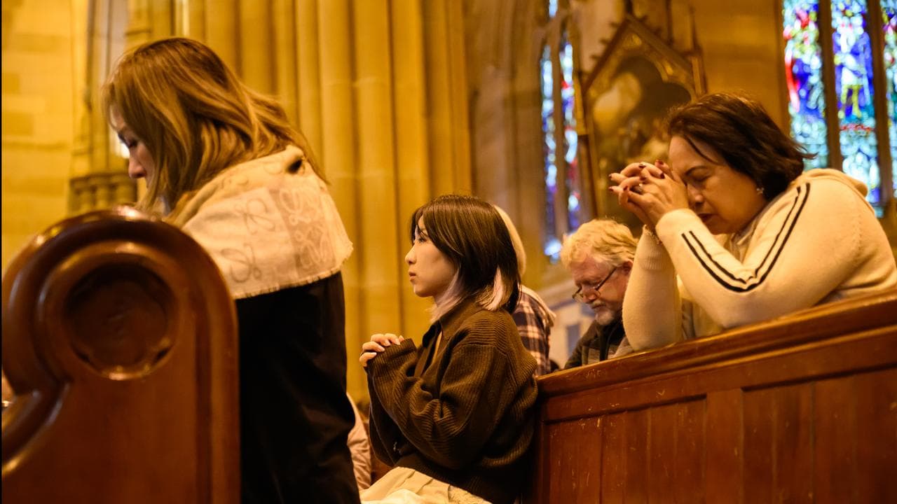 Catholics praying in Sydney
