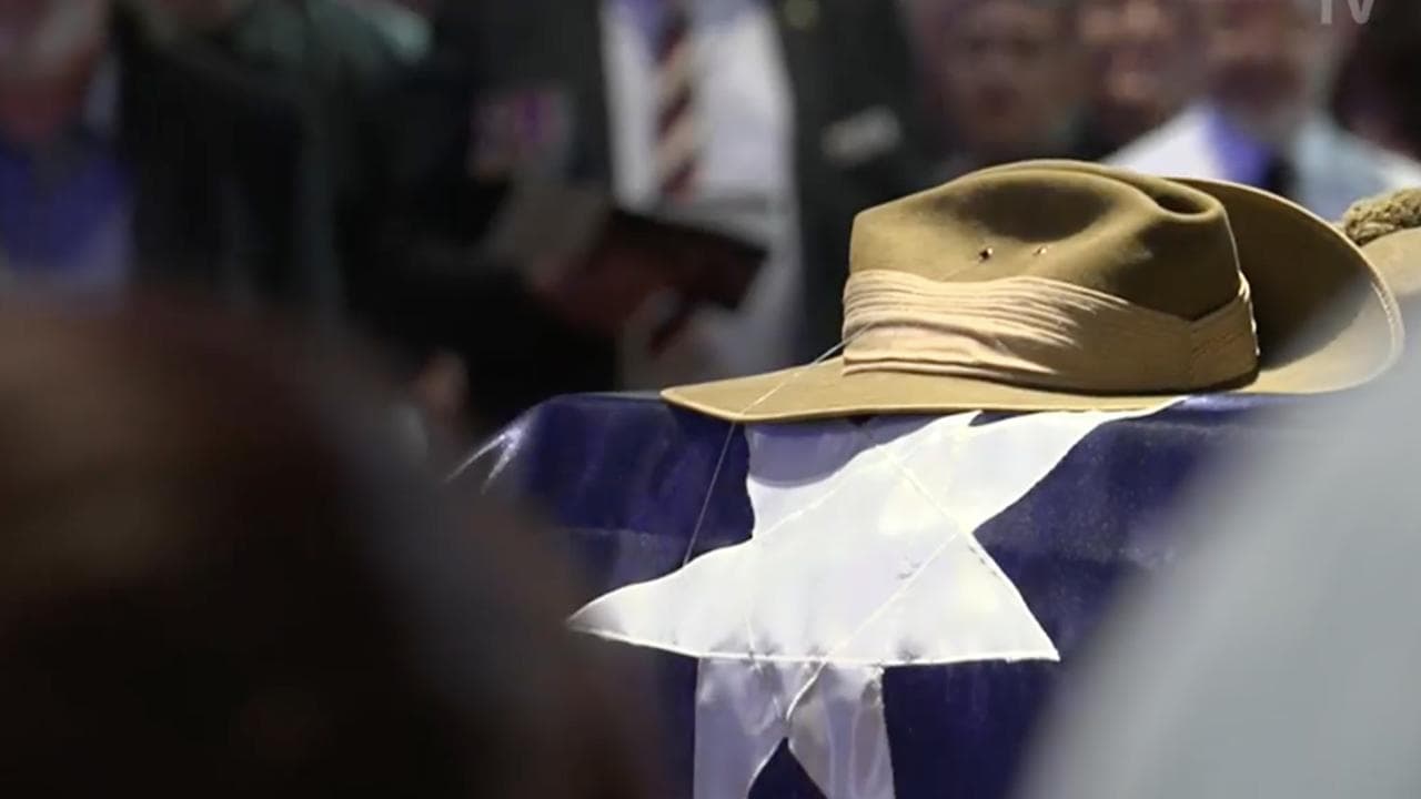 A screenshot from ABC TV's coverage of Arthur Leggett's funeral