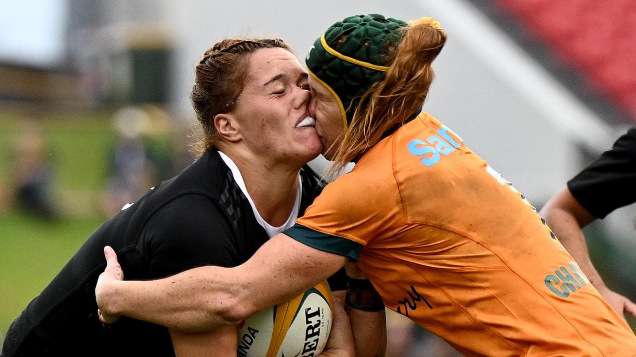 Kaipo Olsen-Baker (left) has a close encounter with Emily Chancellor.