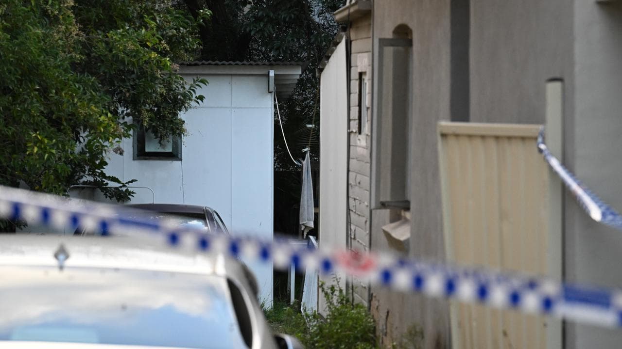 Police at the Homebush West crime scene