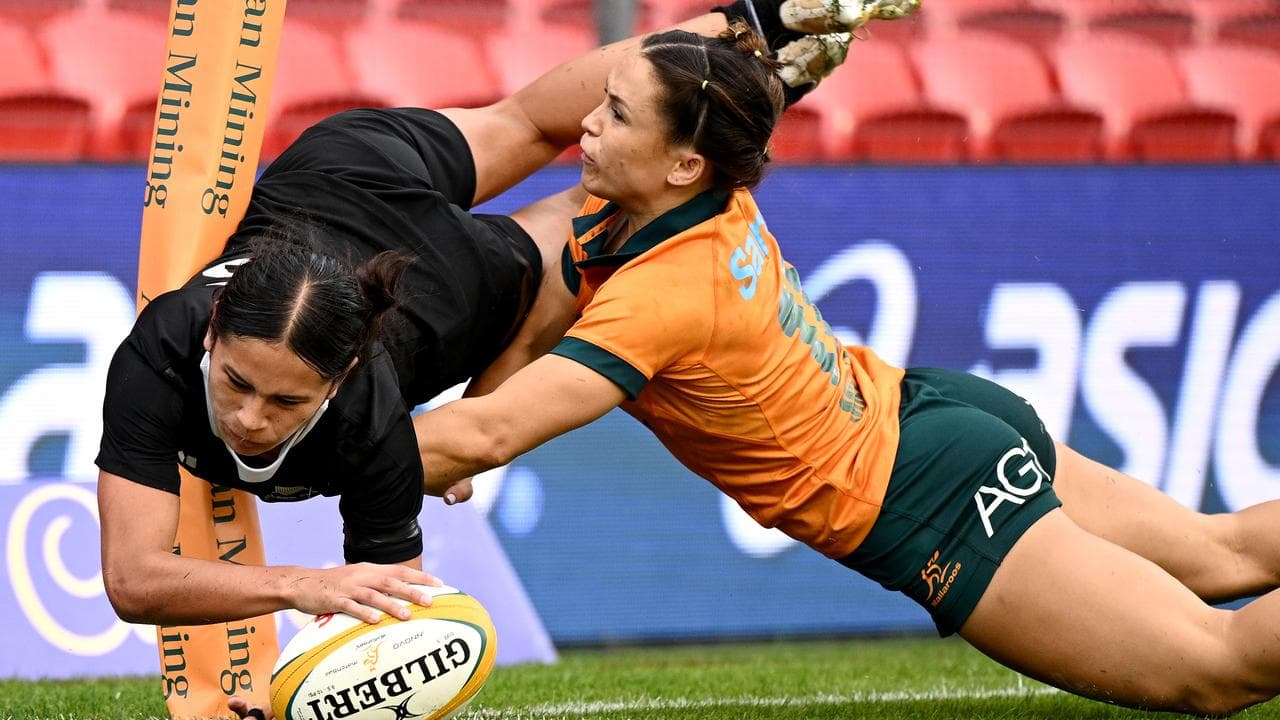 Braxton Sorensen-McGee of the Black Ferns scores a try.