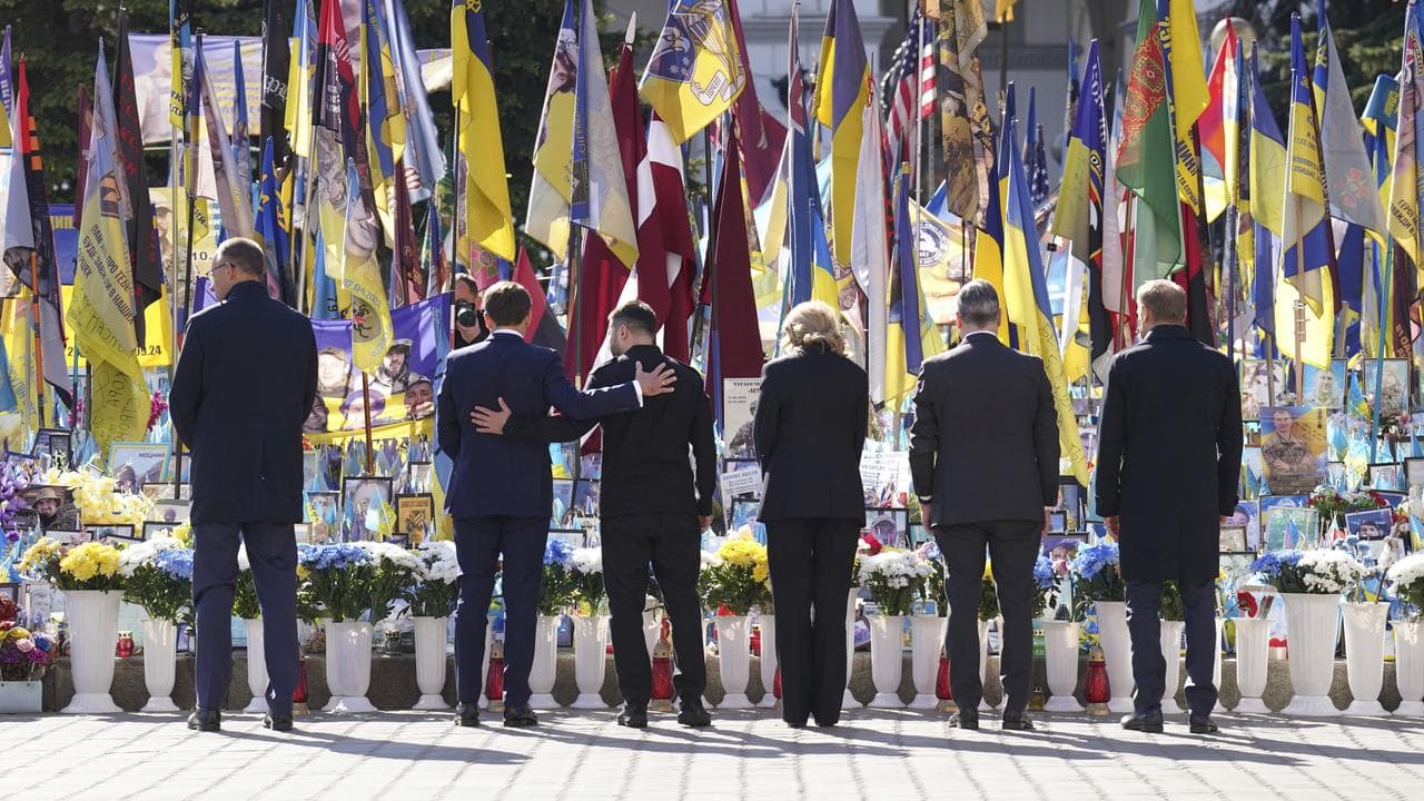 European leaders and Volodymyr Zelenskiy and wife Olena in Kyiv