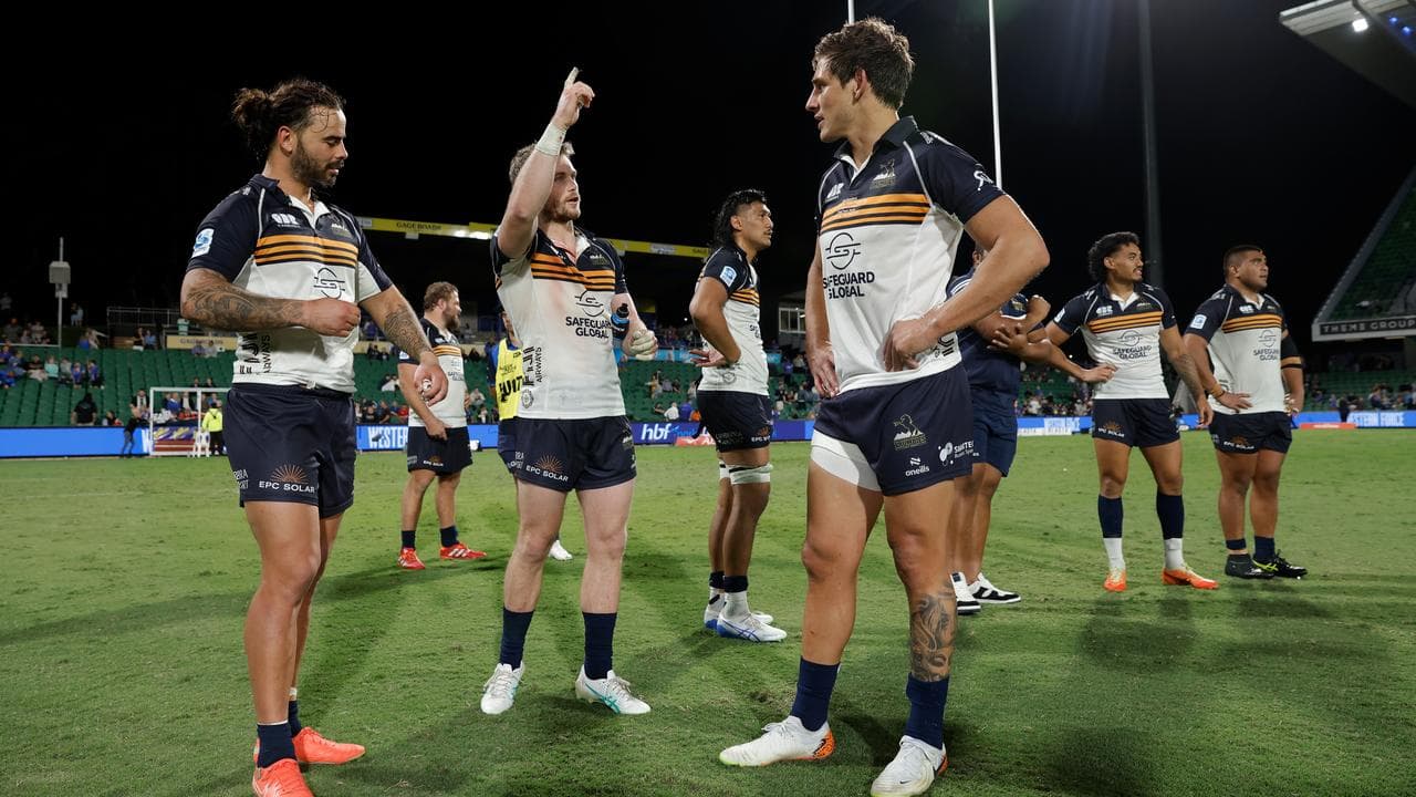 Brumbies players celebrate their victory