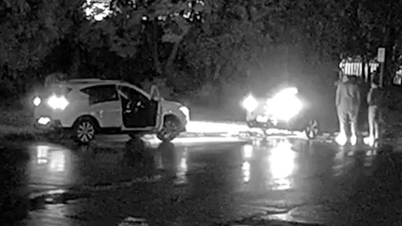 A white SUV and a blue sedan caught on CCTV