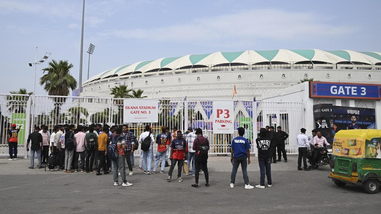 Disappointed fans gather outside the ground in Lucknow