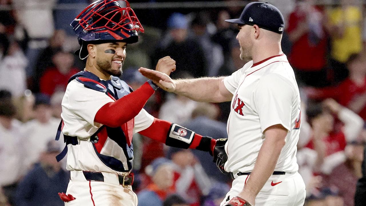 Boston catcher Carlos Narváez (left) and pitcher Liam Hendriks