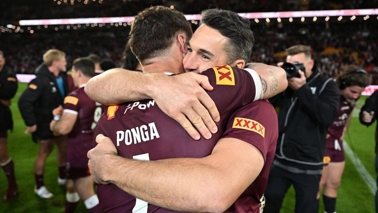 Kalyn Ponga and coach Billy Slater embrace.