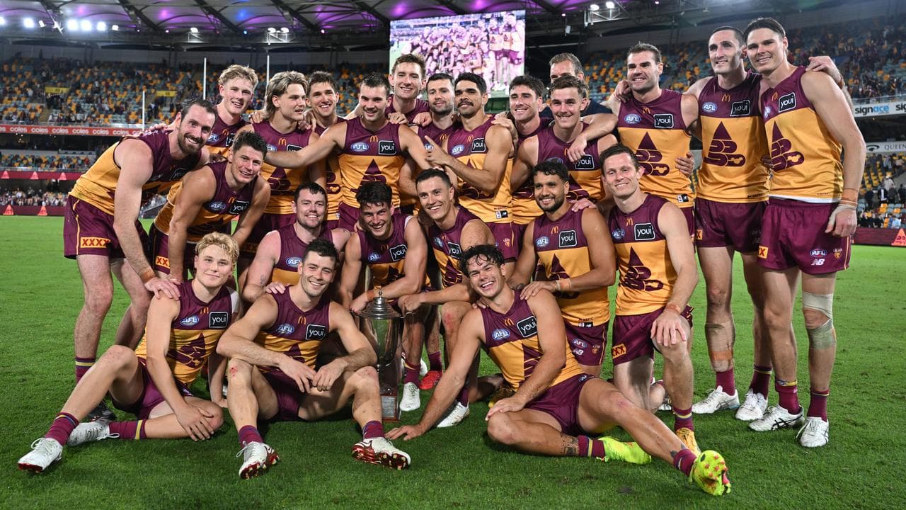 Celebrating Brisbane Lions players.