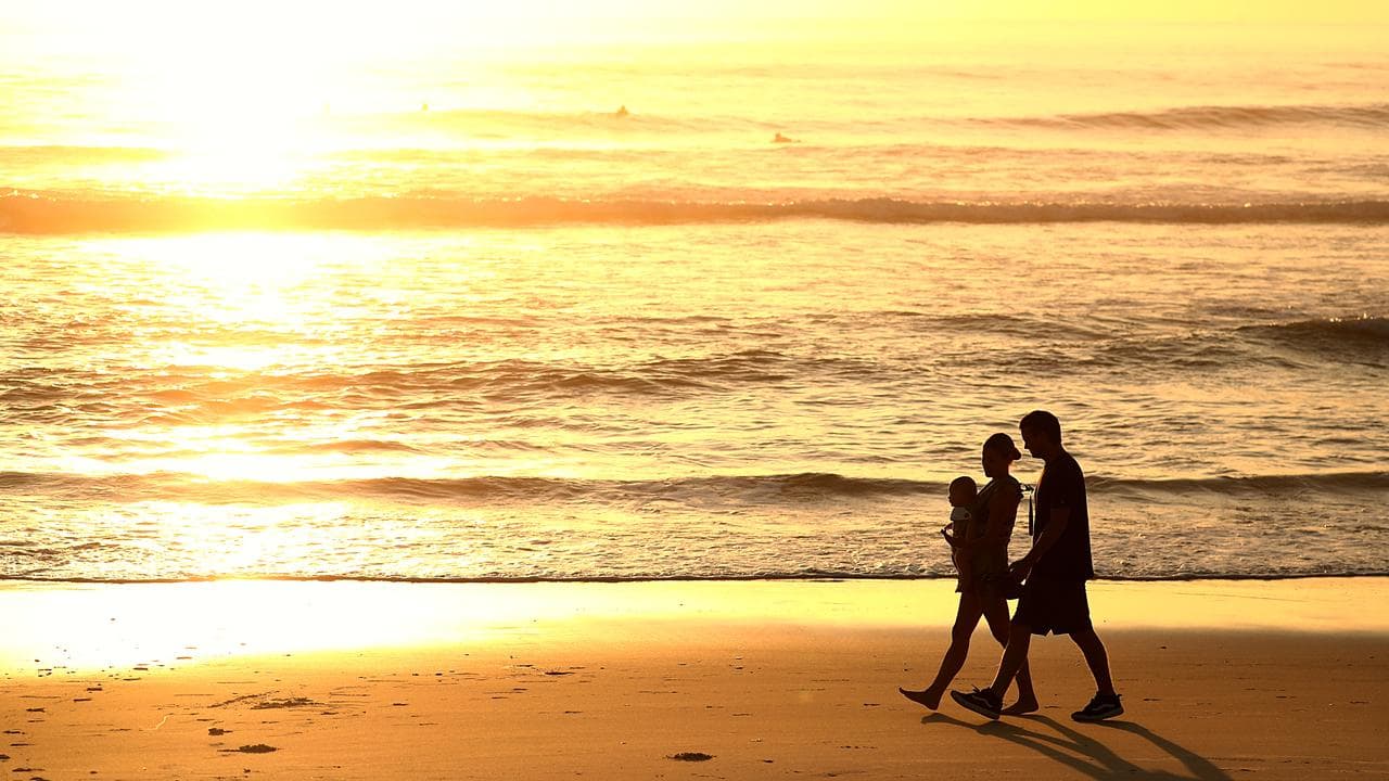 People are seen at sunrise (file image)