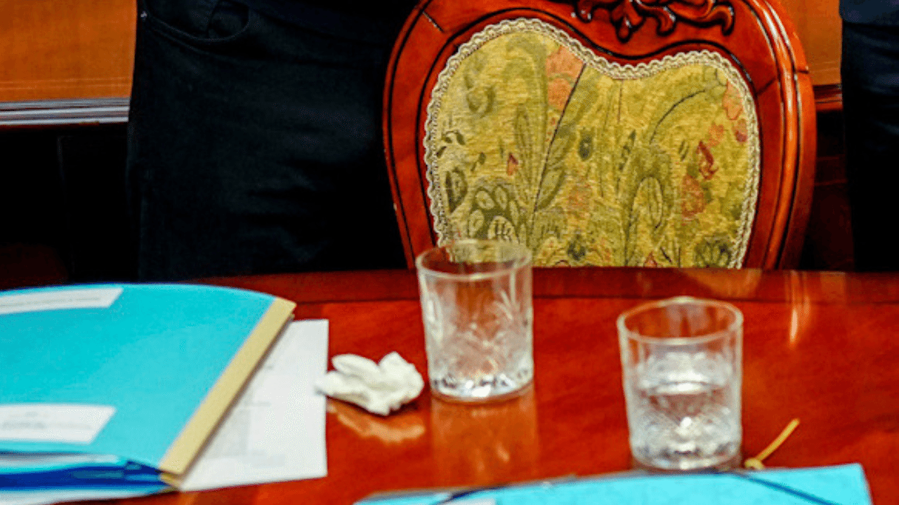 Close up of a tissue and drink stirrer.