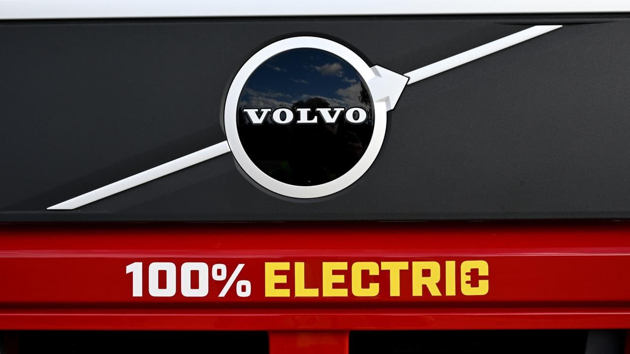 A Volvo logo on a Linfox operated electric truck