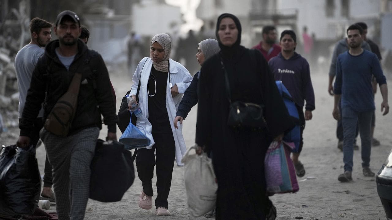 Palestinians evacuate Gaza City's Rimal neighbourhood