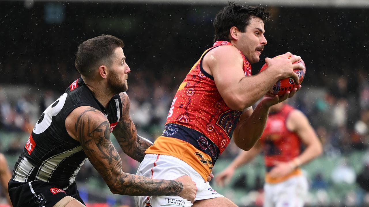 Jeremy Howe (left) had his hands full with Darcy Fogarty.