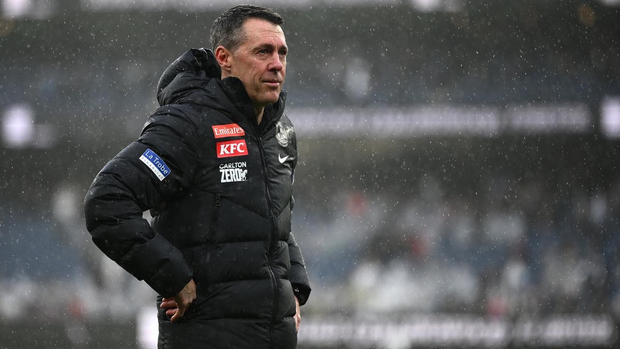 Collingwood coach Craig McRae is overcome with emotion at the MCG.