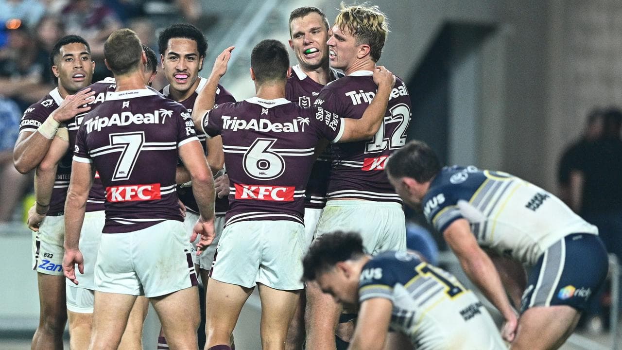Sea Eagles players celebrate Lehi Hopoate's try
