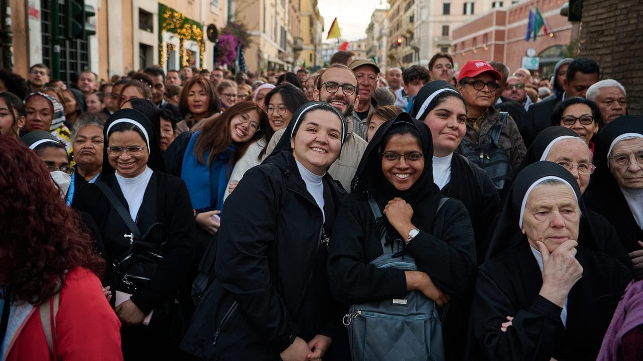 Worshippers attend the inauguration mass of Pope Leo