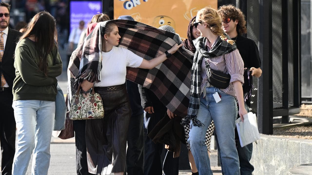 Supporters shield Aahana Nag behind blanket 