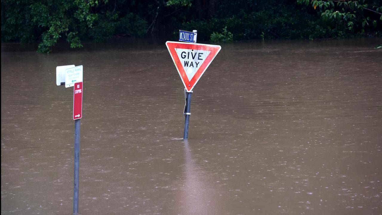 Give Way sign in floodwater