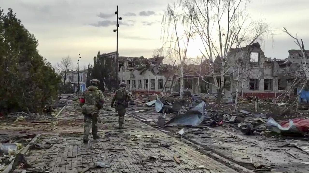 Russian soldiers patrol an area in Sudzha, the Kursk region of Russia