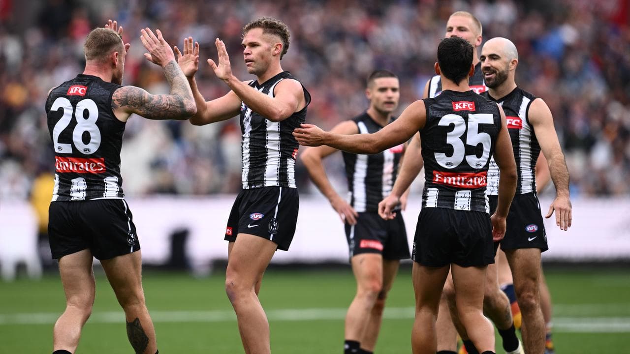 Celebrating Collingwood players.