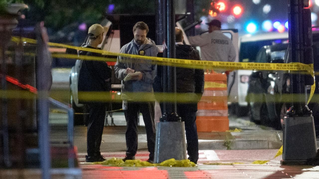 Law enforcement work after a double shooting in Washington