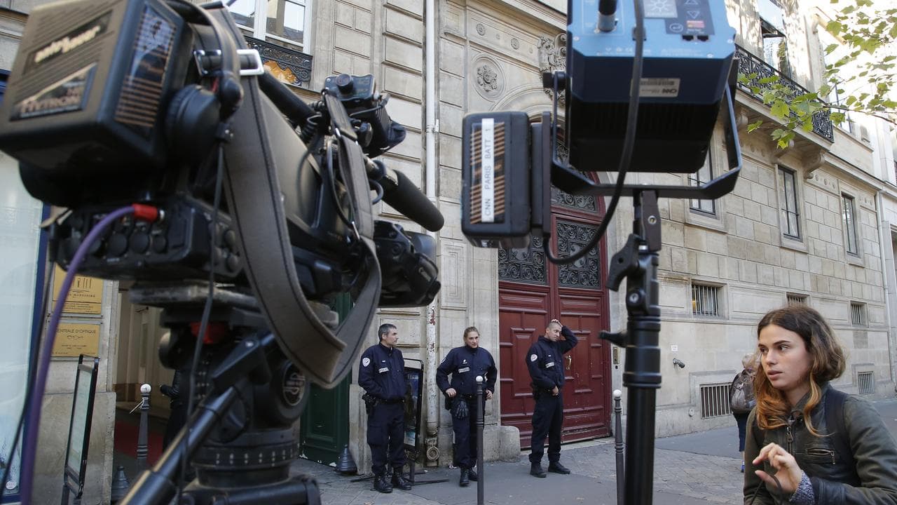 Outside the Paris home of Kim Kardashian following a robbery in 2016