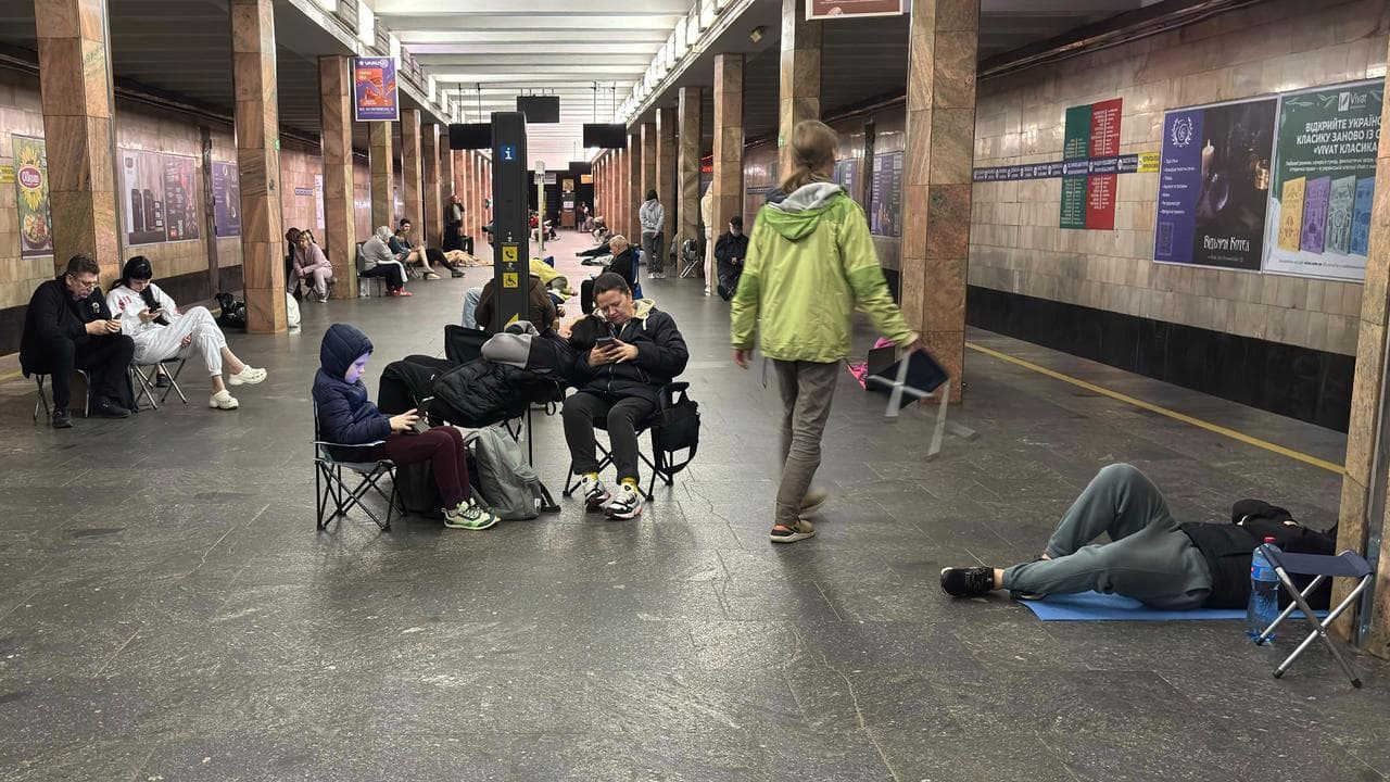 People shelter at a subway station during a Russian attack in Kyiv