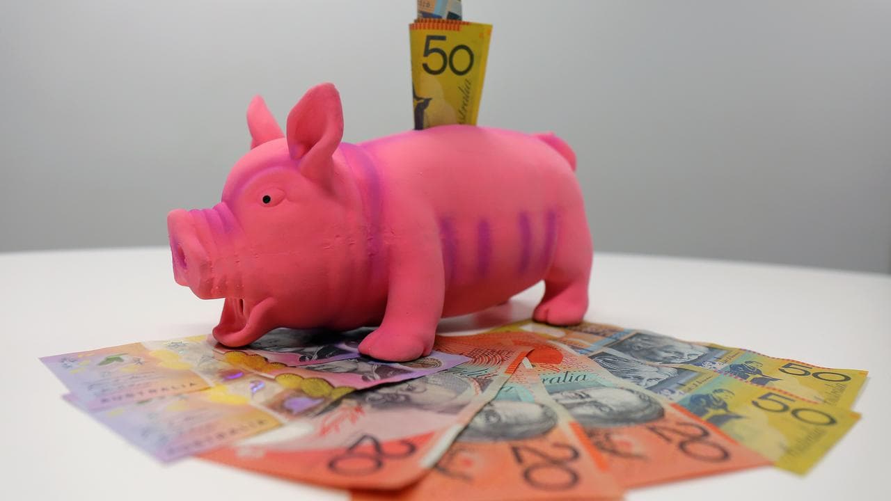 A piggy bank with Australian notes (file image)