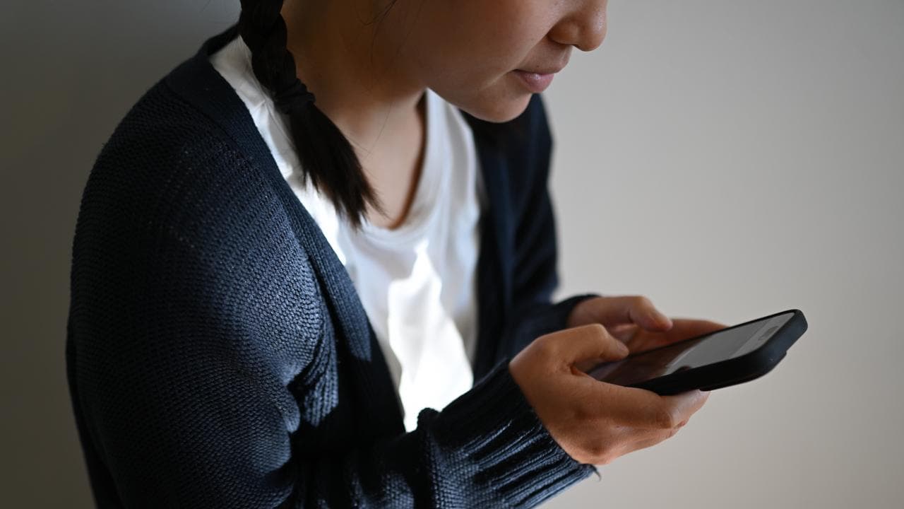 A young woman on her mobile phone (file image)