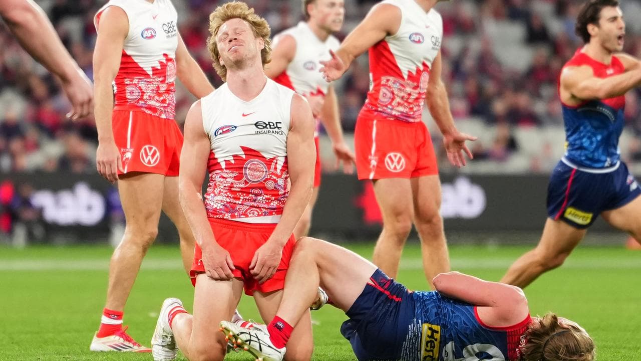Callum Mills of the Swans after a heavy tackle on Charlie Spargo