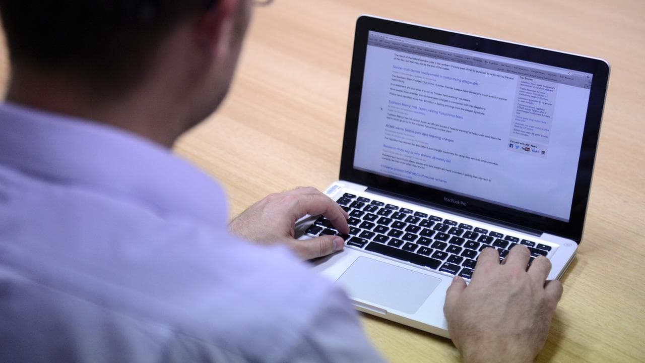 A man uses a laptop computer (file image)