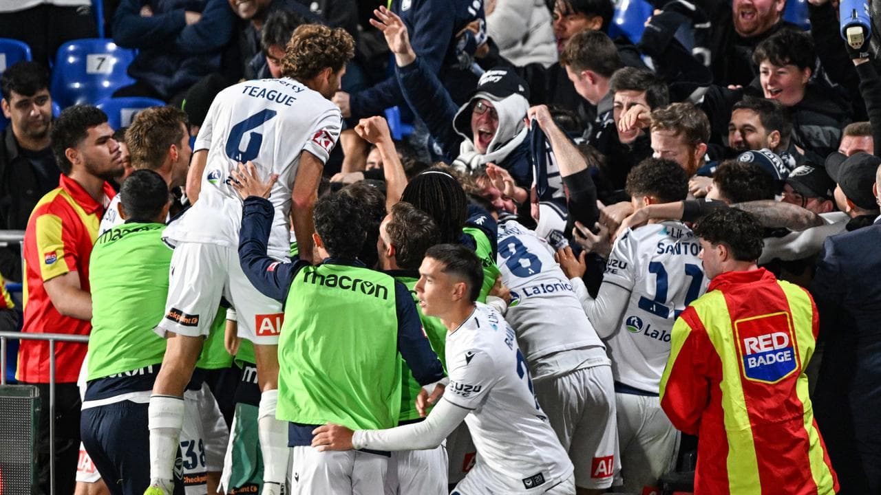 Celebrating Melbourne Victory players and fans.