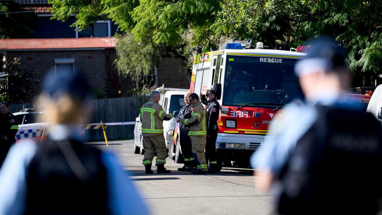 NSW Fire and Rescue and police at a fatal fire.