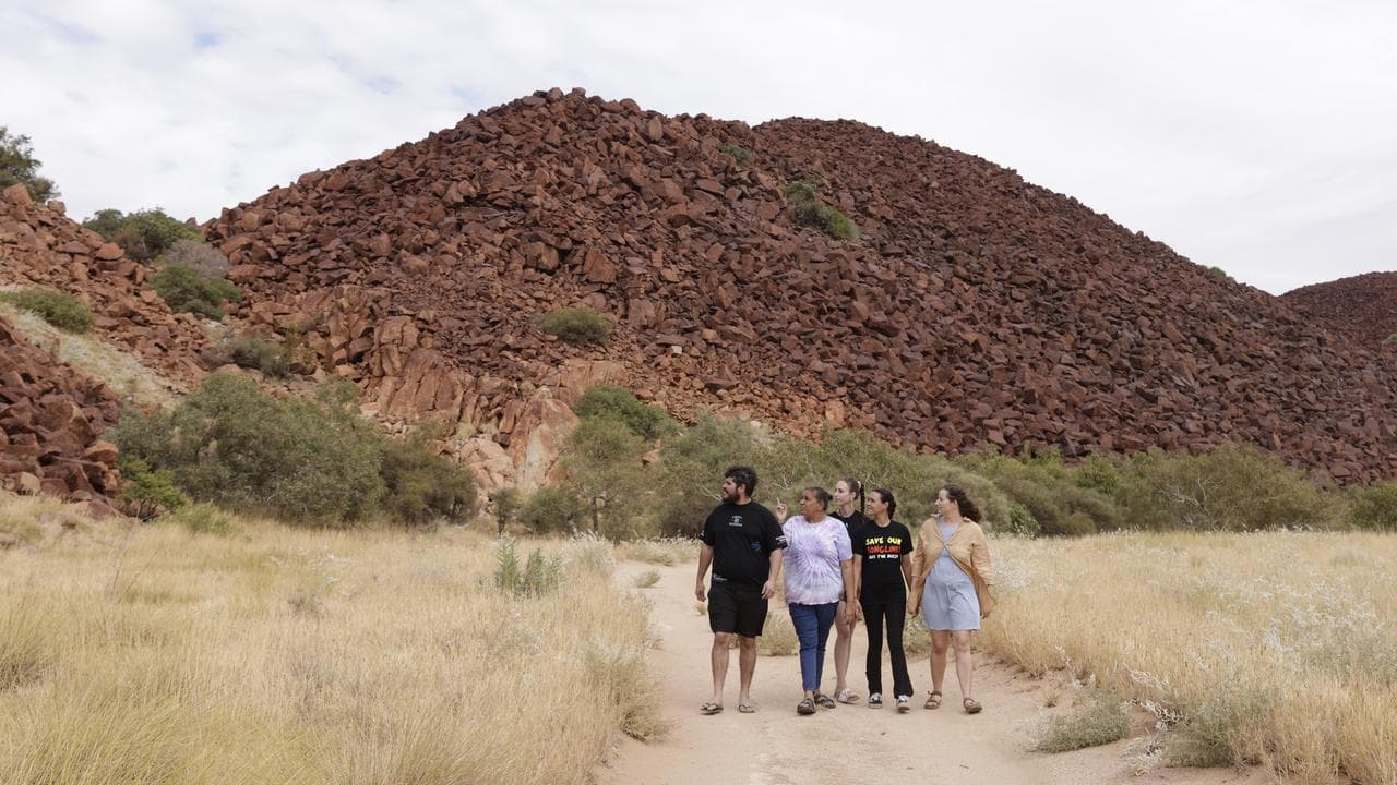 Save Our  Songlines members at the Murujuga rock art site.