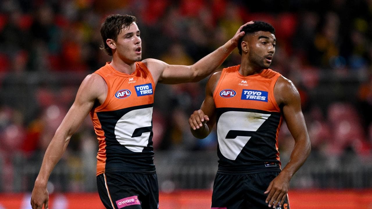 Aaron Cadman  (left) congratulates Callum Brown