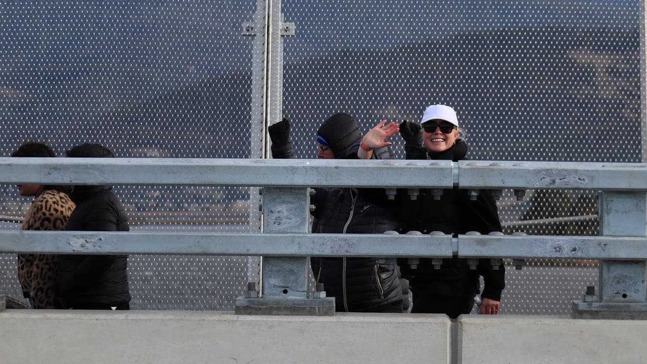 People walking across the new bridge, north of Hobart