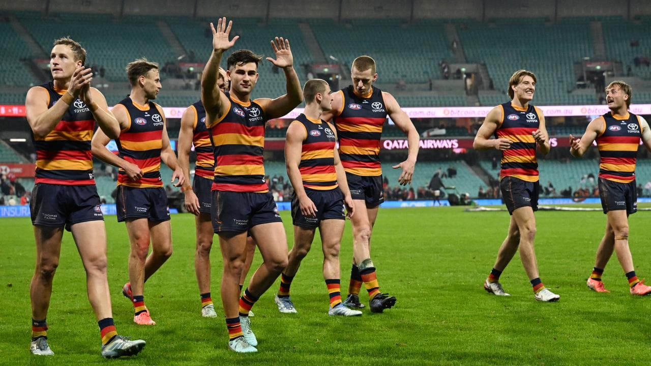 Celebrating Adelaide Crows players.